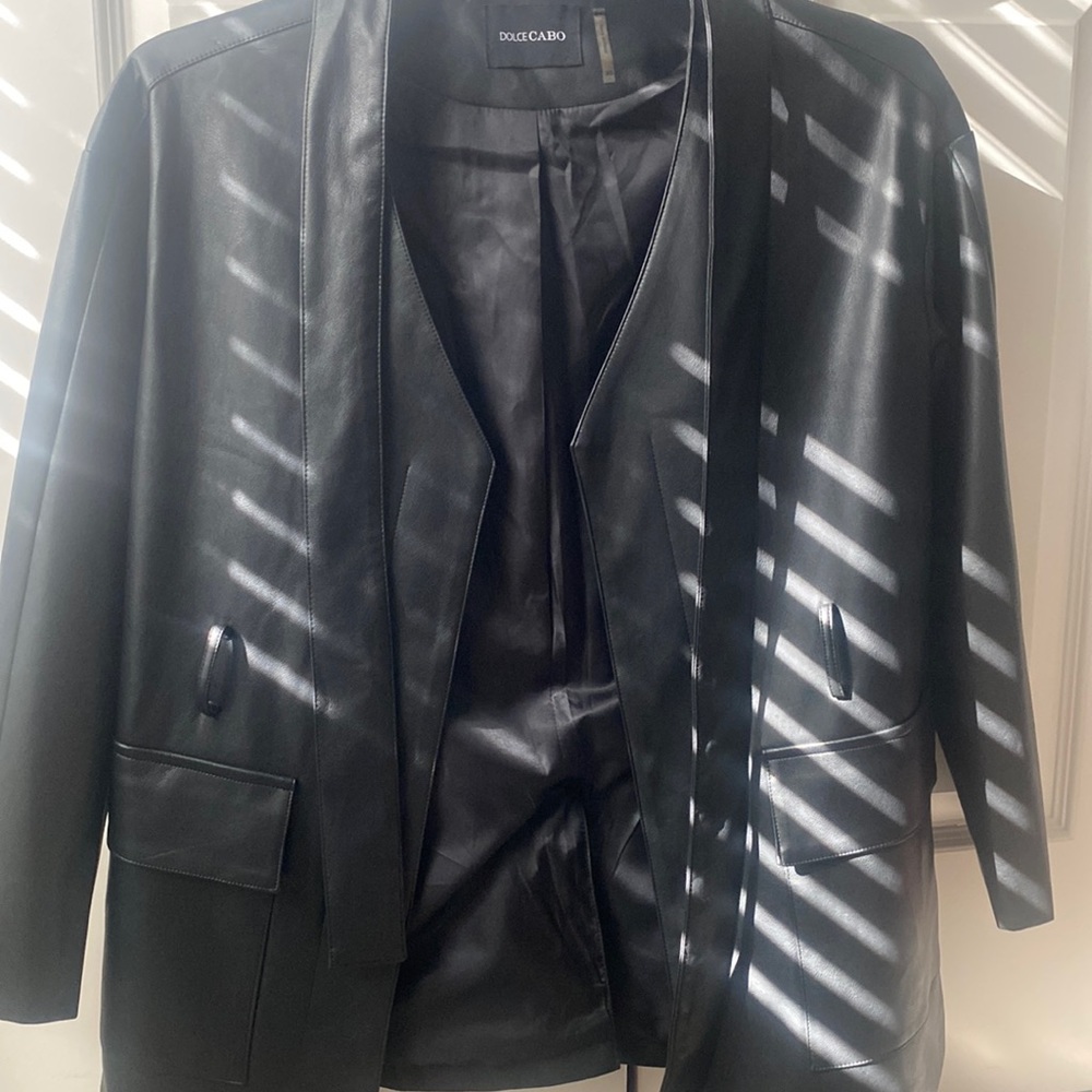 Never worn. No tags. XS